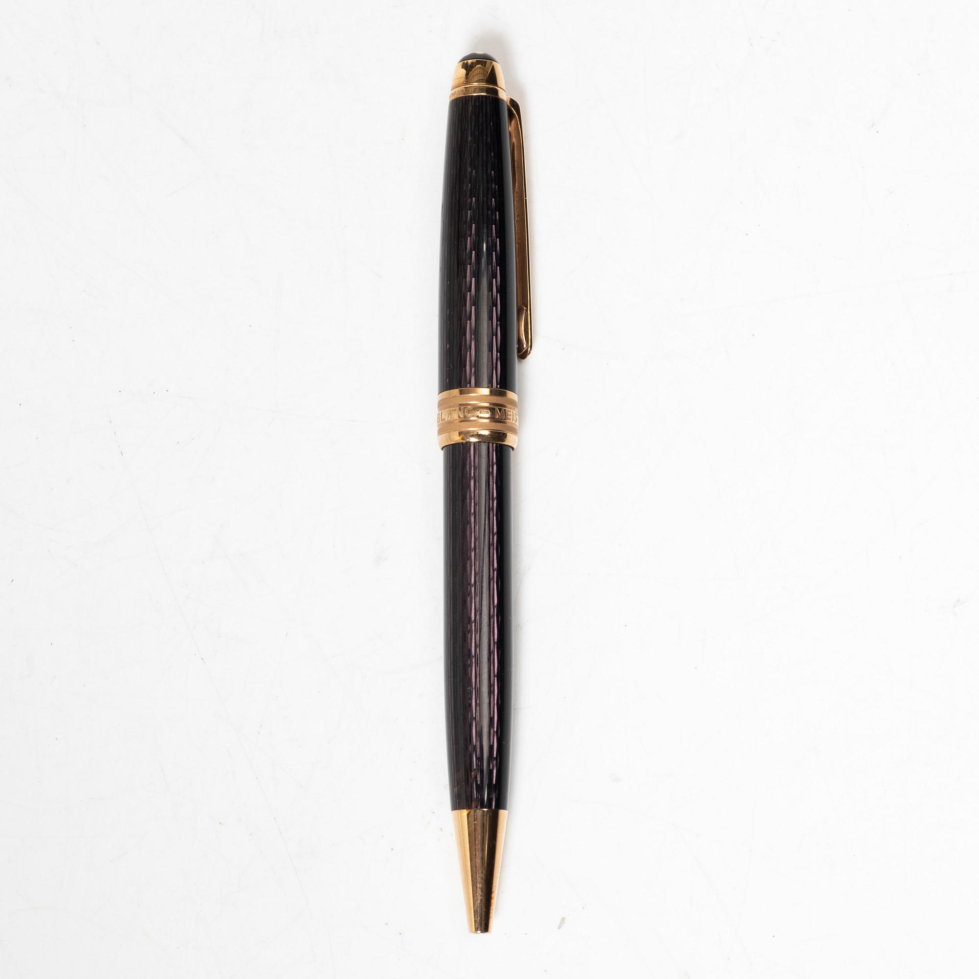 A Mont Blanc Meisterstück 90th Anniversary ed.  ballpoint pen with a case.