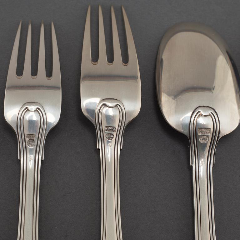 A silver set of table ware of 69 pcs by Georg Jensen, Denmark, from the latter half of the 20th century.