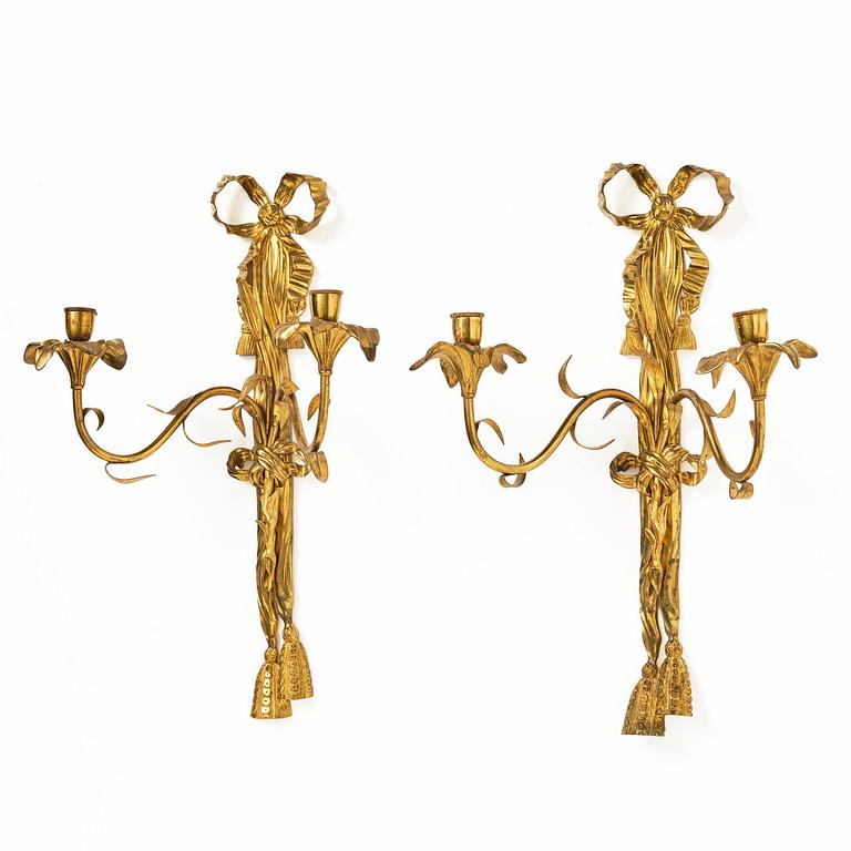 A pair of gilt bronze two-branch appliques after F. L. Rung, late 19th century,