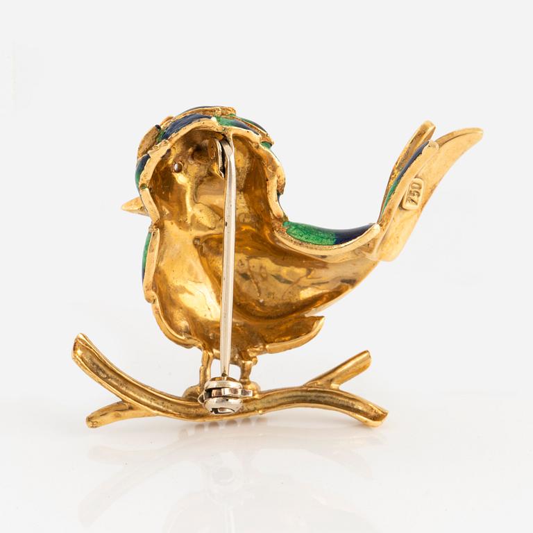 An 18K enamelled gold bird brooch set with an eight-cut diamond.