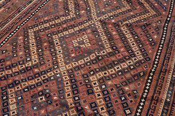 A semi-antique kilim carpet, a. 385 x 251 cm.