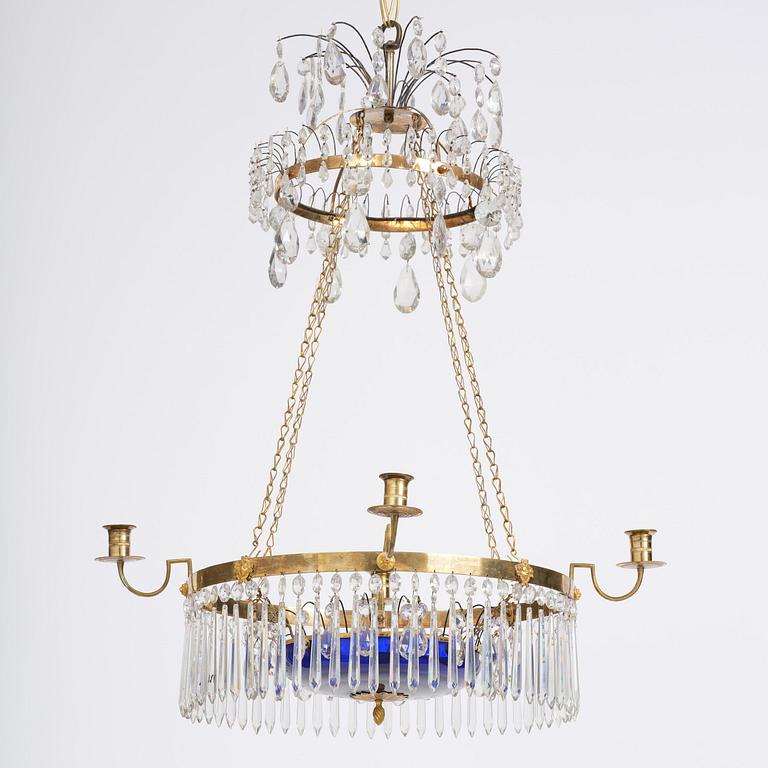 A late Gustavian five-light gilt brass and cut glass chandelier, Stockholm, late 18th century.