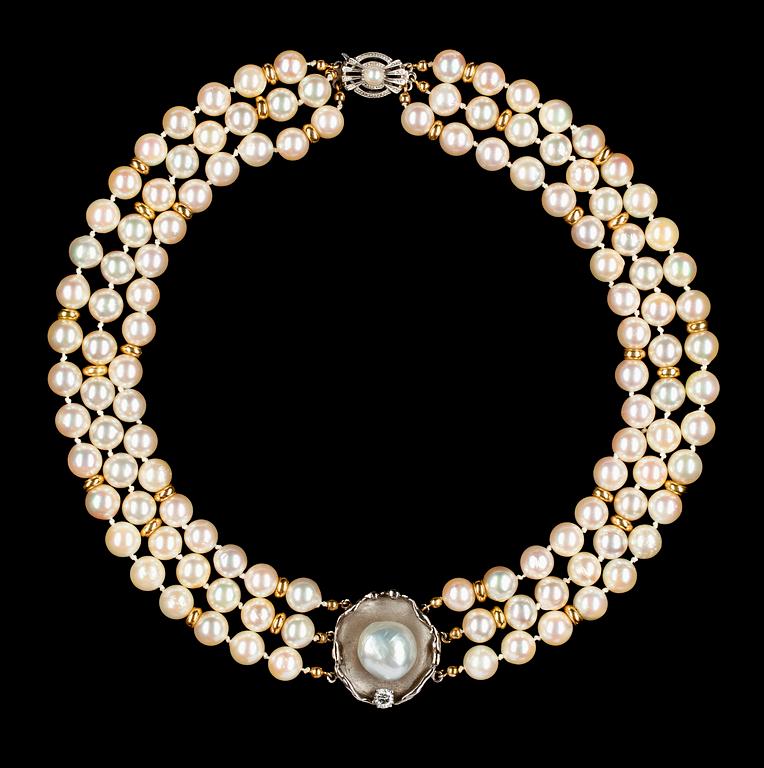 A three strand cultured pearl necklace, 1990's.