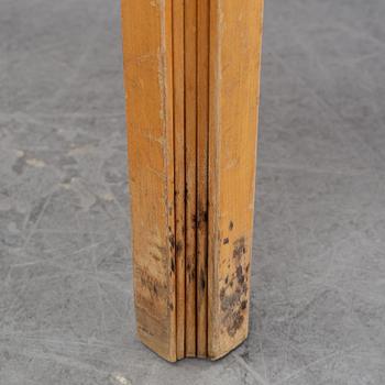 Alvar Aalto, a birch and leather stool, Artek, second half of the 20th century.
