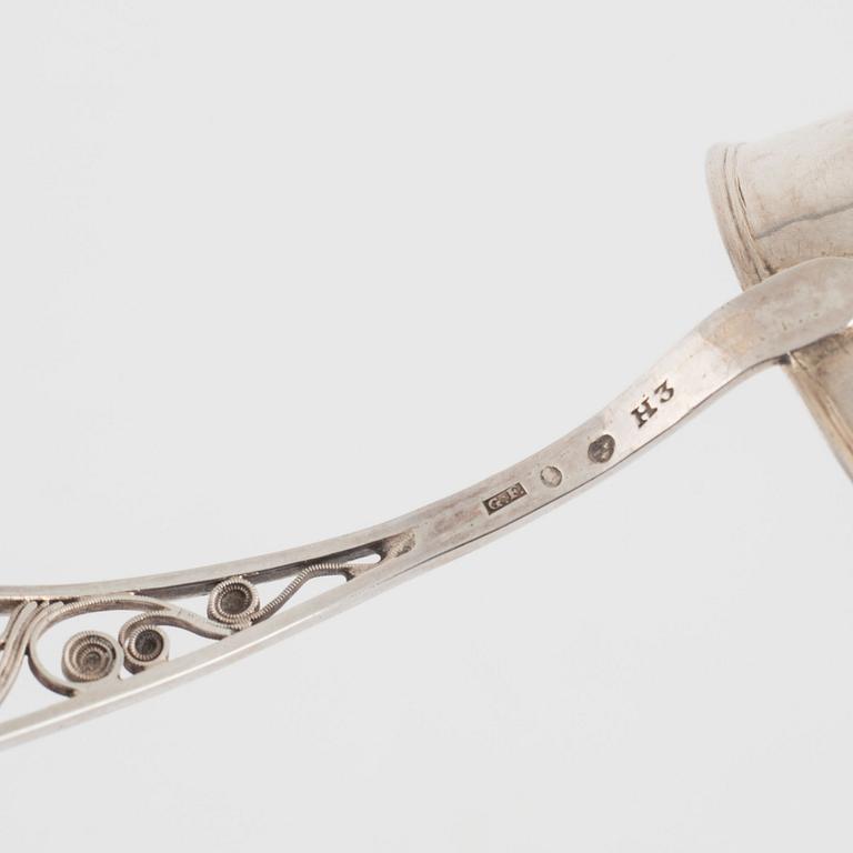 Gustaf Folcker, a silver sugar spoon with filigree, Stockholm 1814.