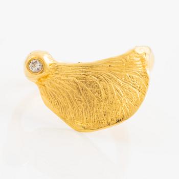 Ring, 18K guld med en rund briljantslipad diamant.