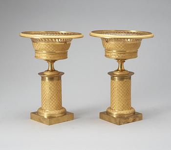 A pair of French Empire early 19th Century gilt bronze tazzas.