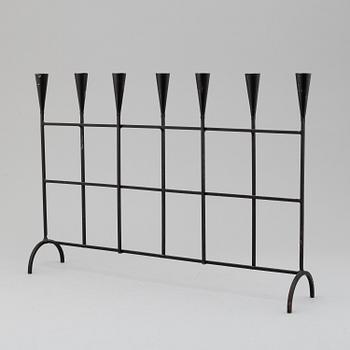 a iron candelabra, 20th century.