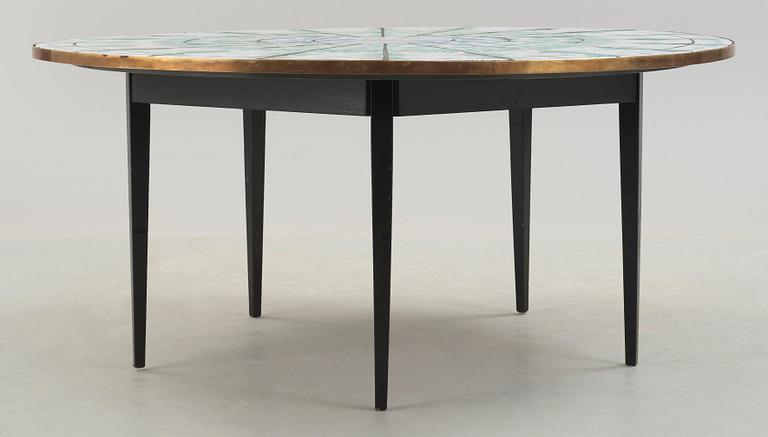 A Björn Wiinblad tiled top dining table, Denmark 1974.