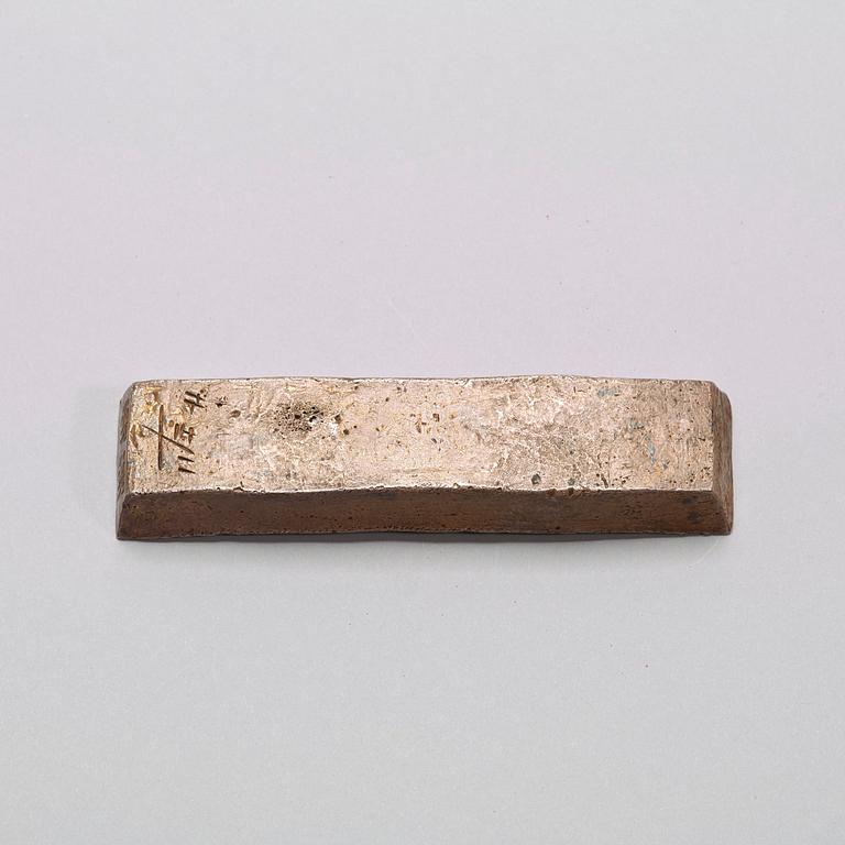 A 10 tael Vietnam (Annam) silver bar ingot sycee, stamped Guangxu (1875-1908).