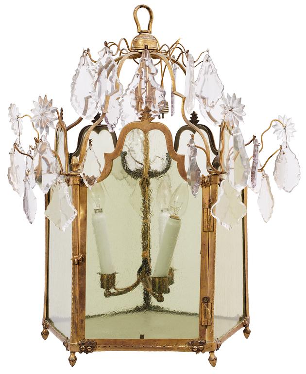 A Russian 18th century Rococo gilt bronze and glass three-light lantern.