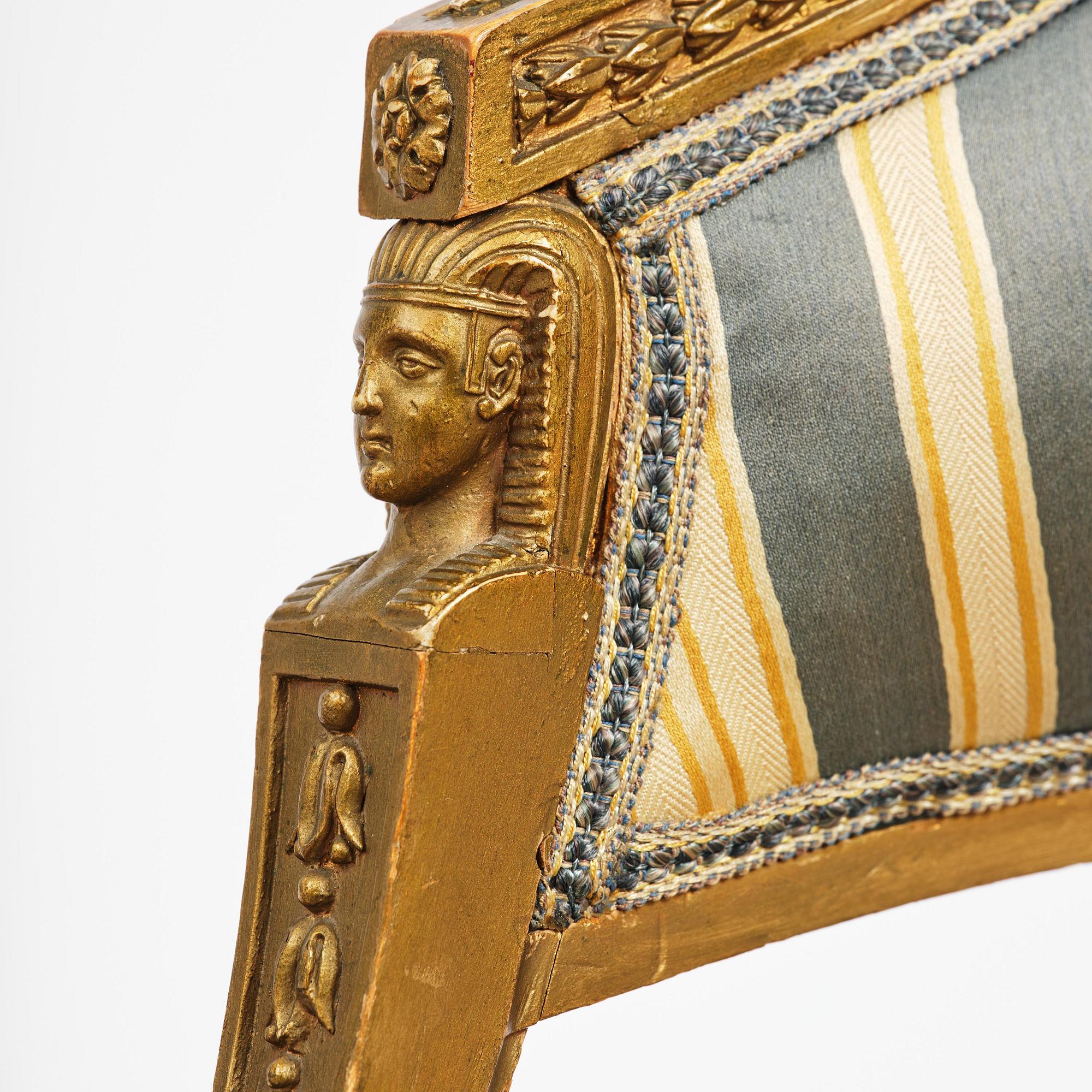 A pair of late Gustavian open armchairs attributed to E. Ståhl (master in Stockholm 1794-1820).