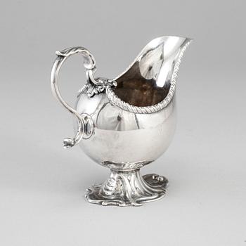 An English 18th century silver sauce-boat, unidentified makers mark, London 1764.