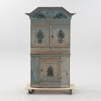 A Swedish painted cabinet, dated 1804.