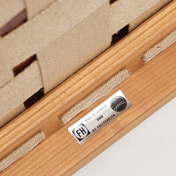 Hans J. Wegner, a pair of the " China Chair" in cherry wood, Fritz Hansen, Denmark 1969.