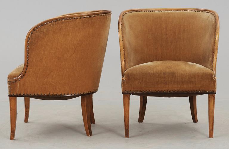 A pair of Nordiska Kompaniet 'Bellman' elm armchairs attributed to Axel Einar Hjorth, Sweden 1929-30.
