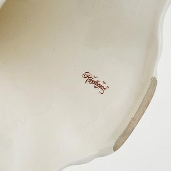 A candelabrum in ceramic named "Daldansen", Rörstrand, from early 20th century.