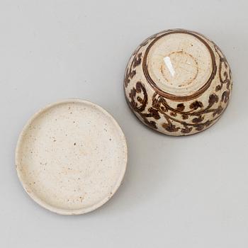 A Sawankhalok box with cover, 15th Century.