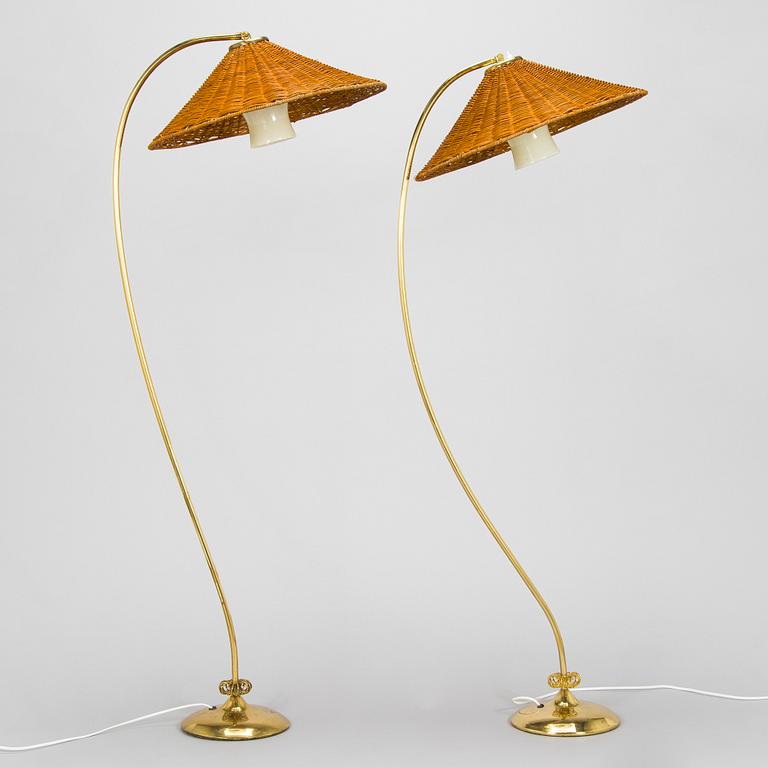 A pair of mid-20th century floor lamps.