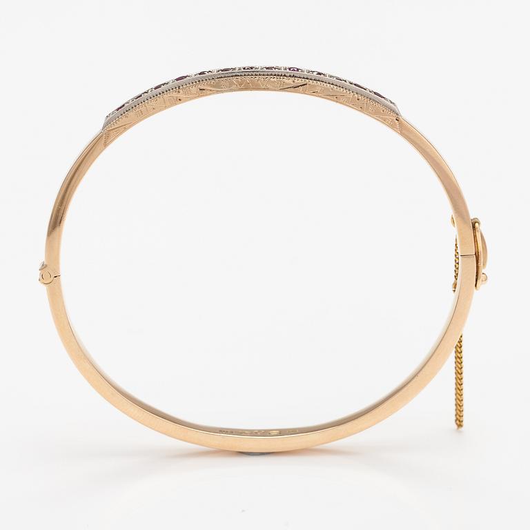 ARMBAND, 14K guld, syntetiska rubiner. Tarkkanen Oy, Helsingfors 1959.