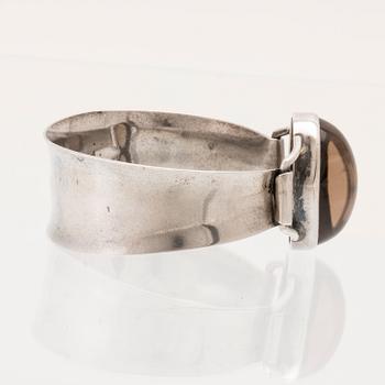 Silver bracelet with cabochon-cut smoky quartz, Gussi Malmö 1964.