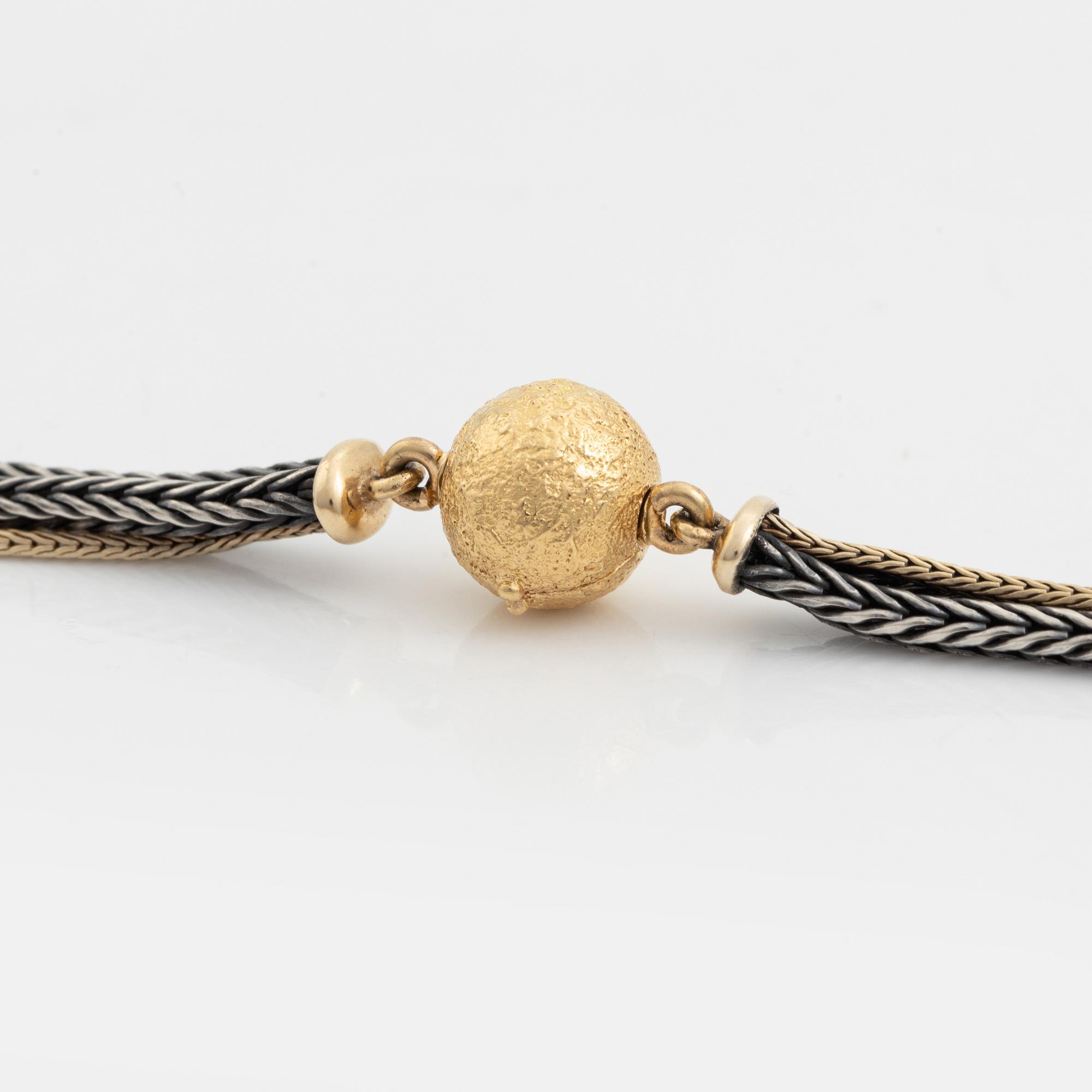 Ole Lynggaard, three strand necklace.