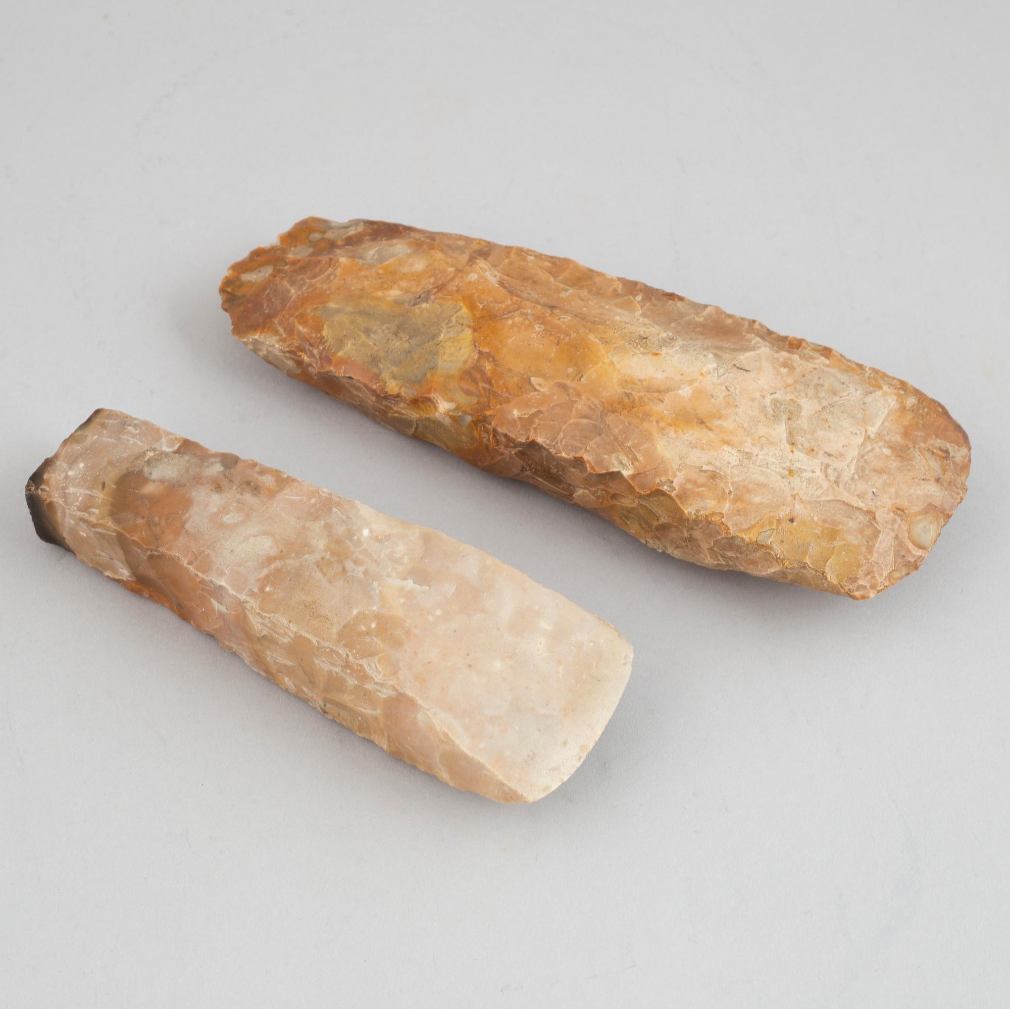 Two neolithic flint axes.