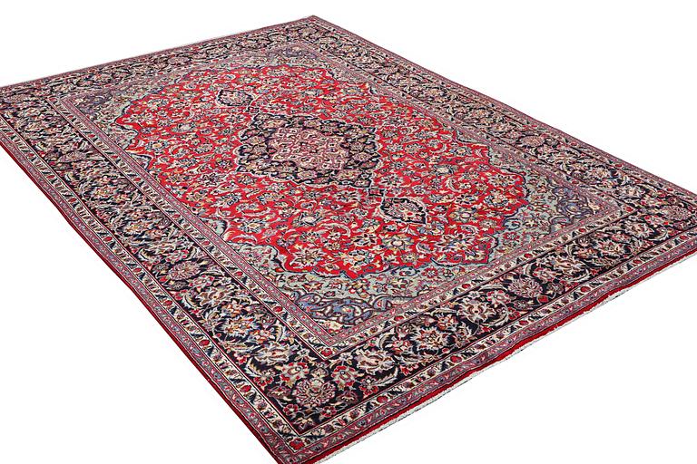 A Kashan carpet, c. 341 x 247 cm .