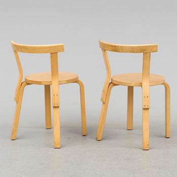Nine model 68 chairs by Alvar Aalto, designed in 1935.