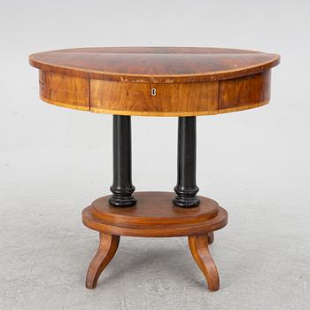 An Empire sewing table, mid-19th Century.