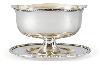 603. A Swedish 20th cent silver sauce-bowl, marks of C.F Carlman Stockholm 1962.