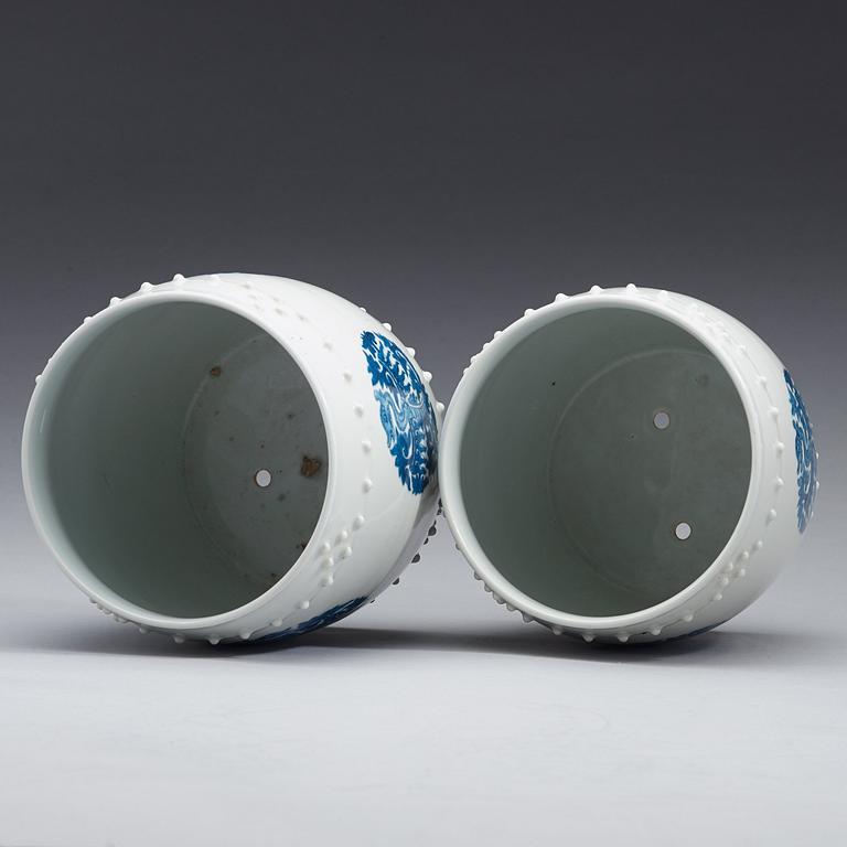 A pair of Chinese blue and white flower pots, early 20th Century.