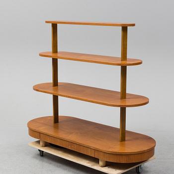 A mid Century Modern teak shelf.