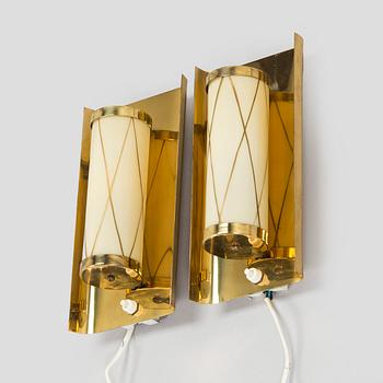 A pair of mid 20th century wall lights for Aris, Arisuo, Finland.