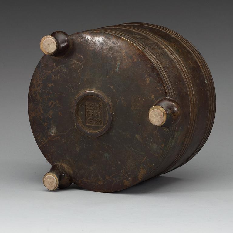 A large bronze tripod censer, Ming dynasty (1368-1644), with Xuande six character mark.