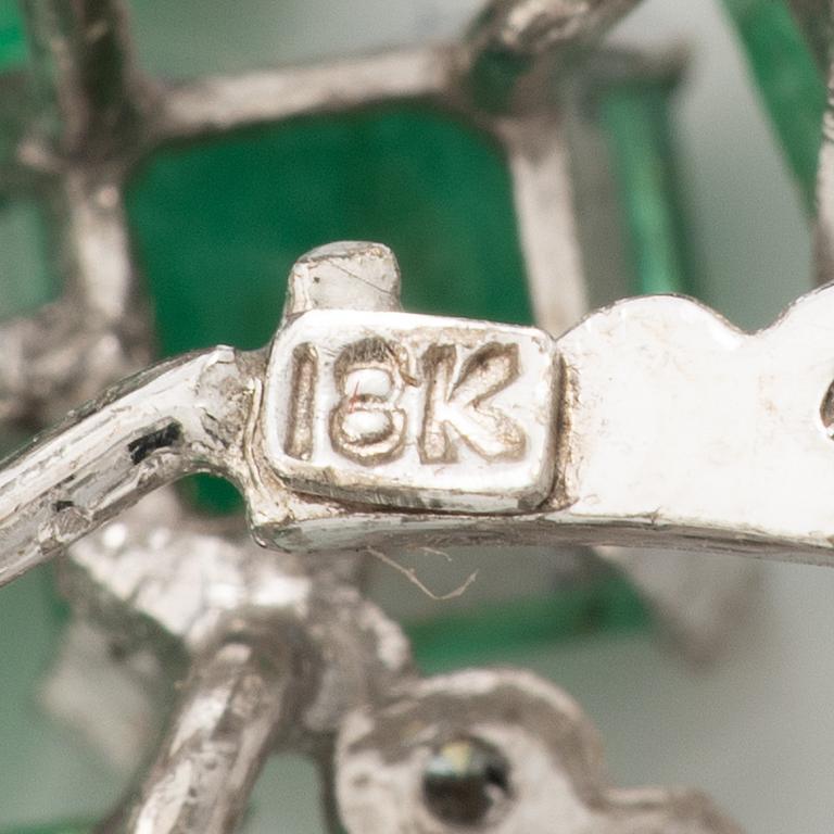 Brooch, 18K white gold with emeralds and octagonal-cut diamonds.