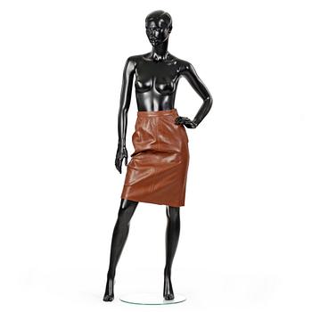 413. YVES SAINT LAURENT, a brown leather skirt.