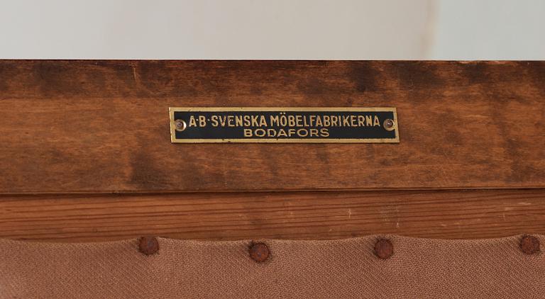 A pair of 1930's armchairs attributed to Axel Larsson,
Svenska Möbelfabrikerna, Bodafors.