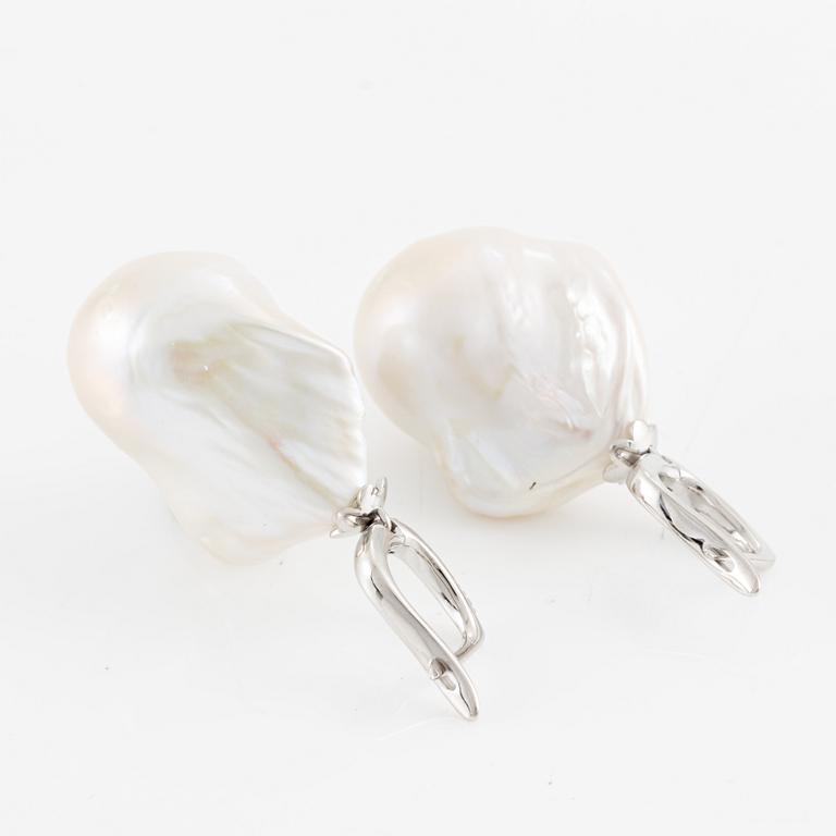 Earrings, a pair, 18K white gold with baroque cultured freshwater pearls and brilliant-cut diamonds.