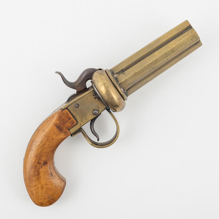 A brass percussion revolver by Johan Engholm (1820-1918).