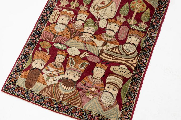 A Persian Kerman Laver 'Mashahir' ('The rulers of the world') rug, c. 82 x 63 cm.