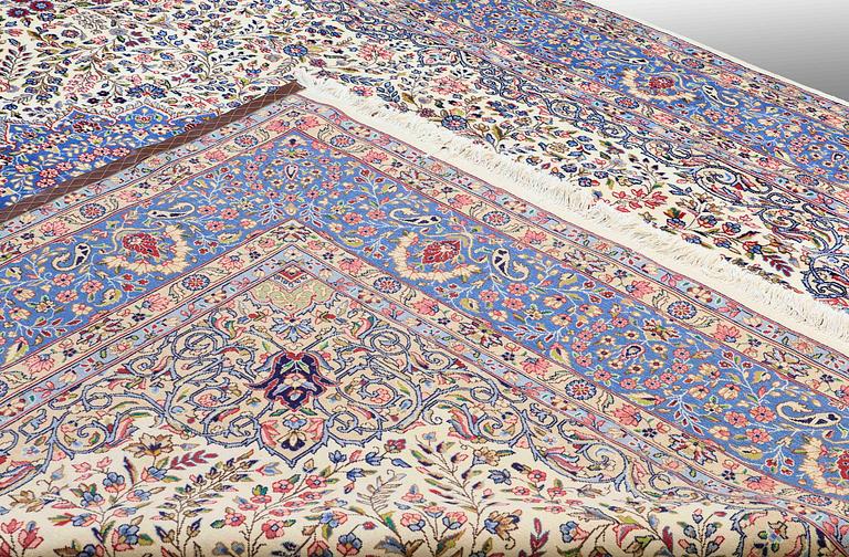 A carpet, Kerman, ca 400 x 295 cm.