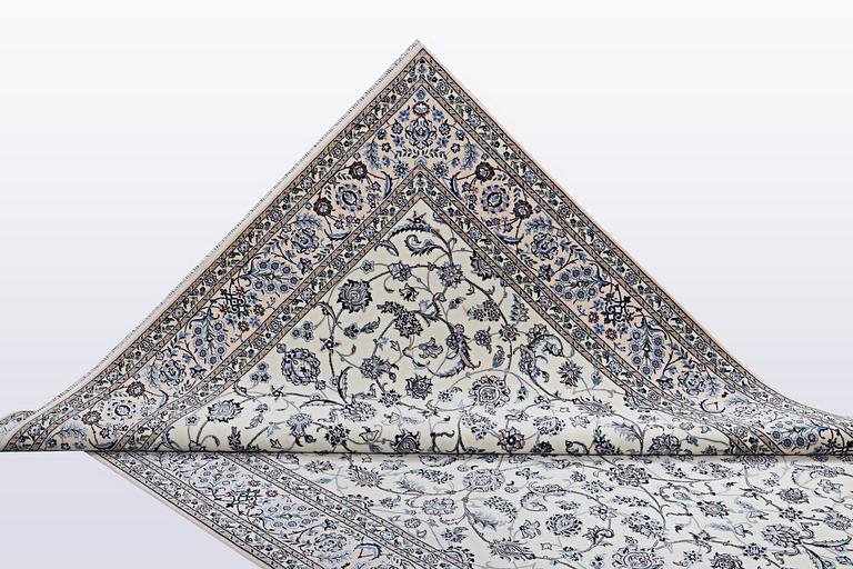 A carpet, Nain, part silk, 6 Laa, ca 301 x 203 cm.