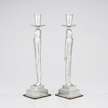 Edvin Öhrström, a pair of pewter and brass 'Egyptian' candlesticks, Svenskt Tenn, Sweden 1984.