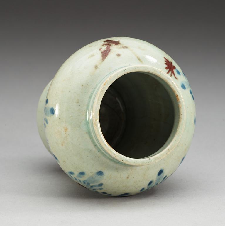 A blue and white and copper red vase, Korea, 19th Century.