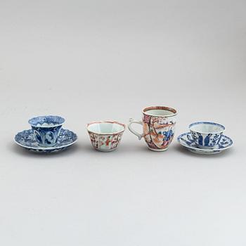 A group of four different cups with 2 odd dishes, Qing dynasty, Kangxi and Qianlong (1736-95).