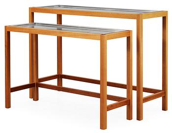 344. A Josef Frank set of mahogany and stainless steel tables by Svenskt Tenn.