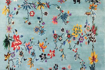 An oriental carpet, a. 370 x 261 cm.