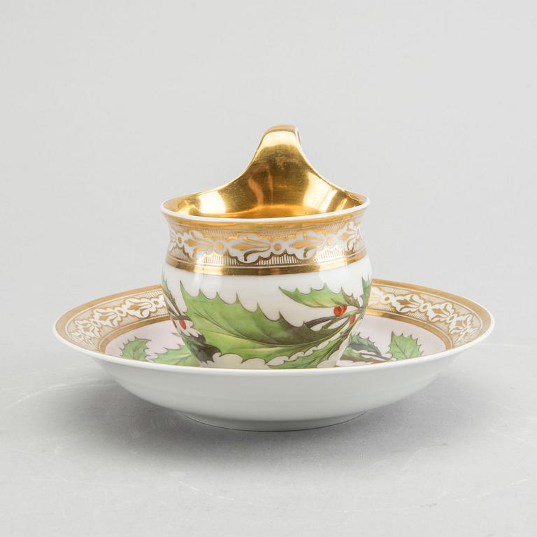 A KPM porcelain cup and saucer ca 1813-15.