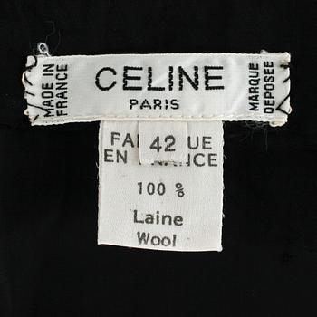 CÉLINE, a black pleated wool skirt.